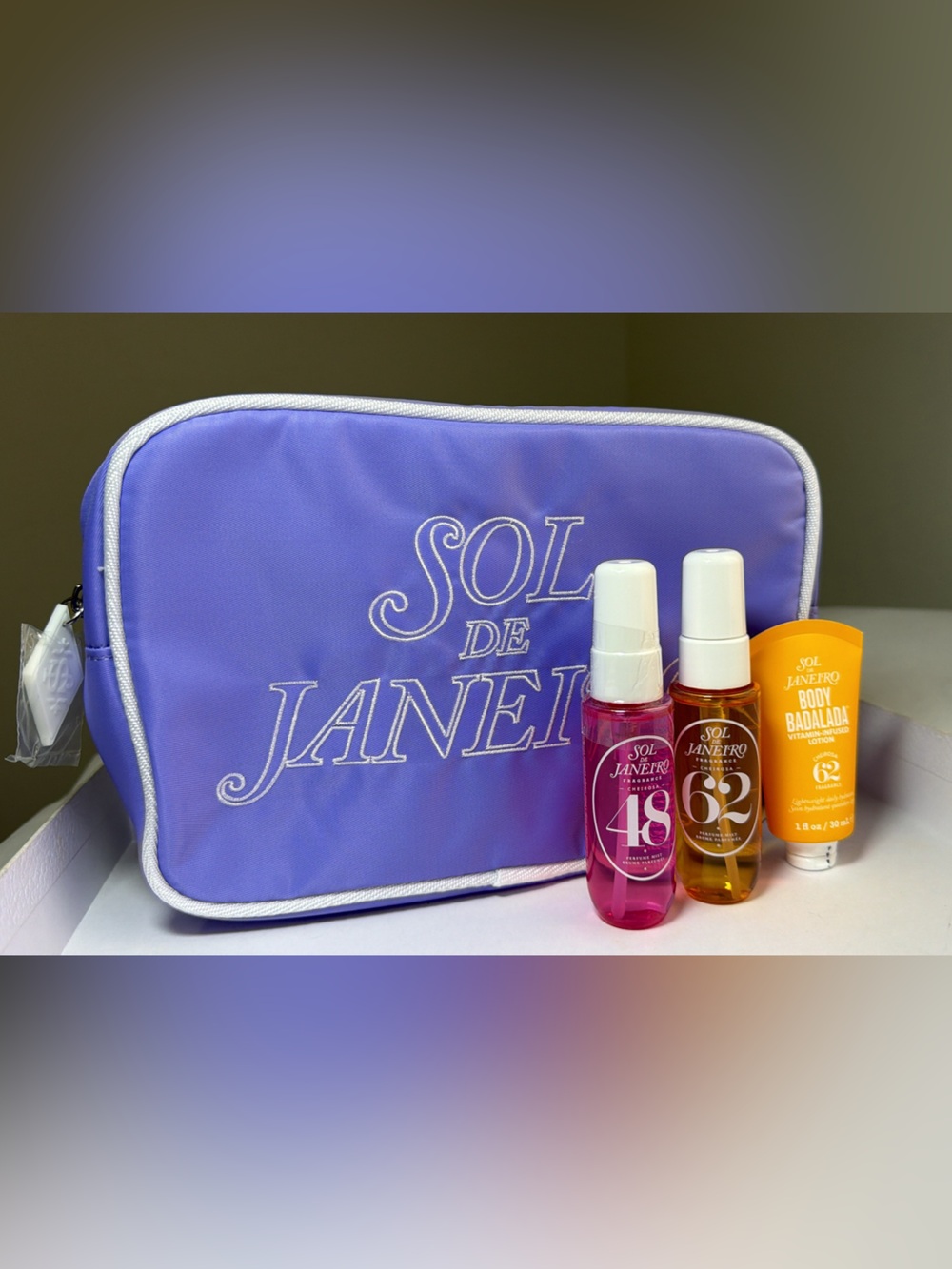 New, authentic Sol de Janeiro large bag /Vibrant Collection set / 3 travel size